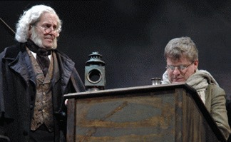 Scrooge (Peter Moore) and Bob Cratchit (Andy Paterson) det.