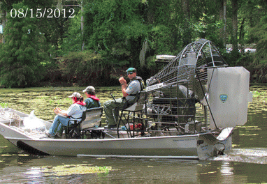 Parish officials, DEQ, LDWF agents depart to take air samples @ sinkhole site.