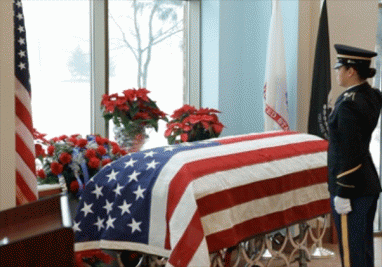 A military official presides over a traditional military funeral for a World War