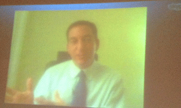 Glenn Greenwald speaking to the audience via Skype, on 4 Huge Screens