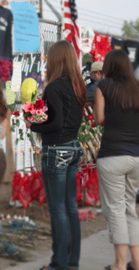 Visitors pay their respects.