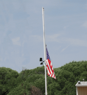 Prescott flag at half-staff.