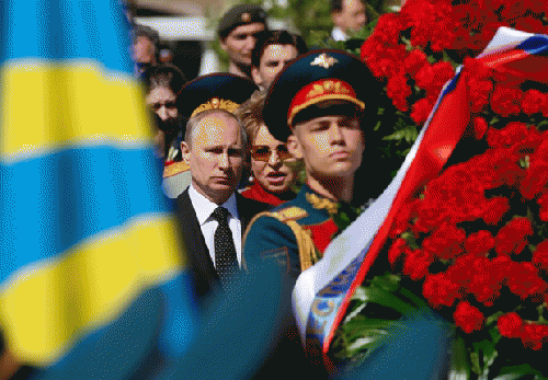 Russia's president, Vladimir Putin, attends a wreath-laying ceremony at the Tomb of Unknown Soldier outside the Kremlin in Moscow, to mark the 69th anniversary of victory in the second world war.