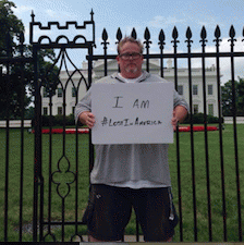 Rotimi at White House, sign says: I am #LostInAmerica