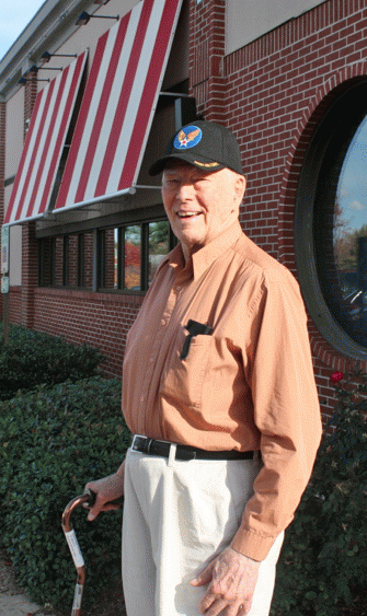 The author's dad, WW2 vet, Ralph Butler, after enjoying his free lunch on Veteran's Day, 2013, at TGIFriday's.