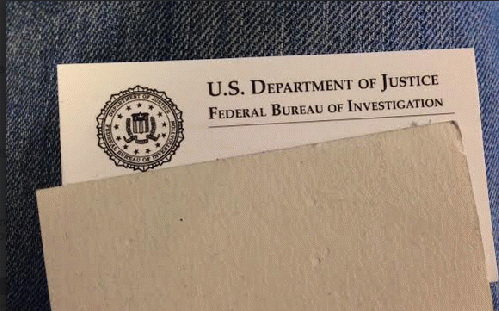 Card from the FBI agent, identity obscured