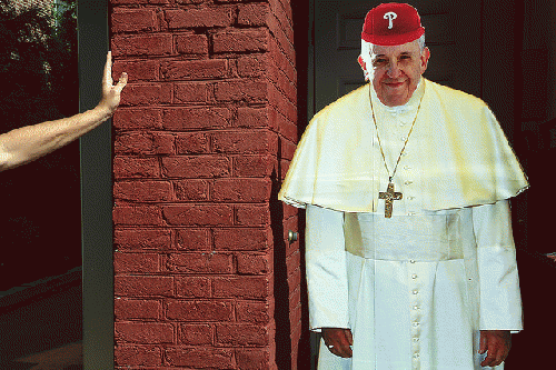 Pope Francis standee outside Swiss House Bakery