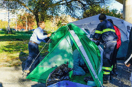 Tents were disassembled by city and contract workers. Some belongings were loaded on trucks and some were thrown away., From ImagesAttr