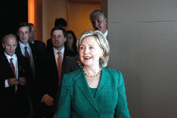 Secretary Clinton Enters the Press Briefing