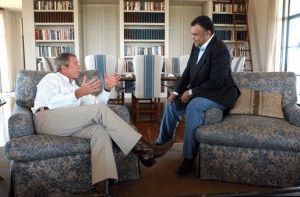 President George W. Bush meeting with then-Saudi Ambassador Prince Bandar bin Sultan at the Bush Ranch in Crawford, Texas.