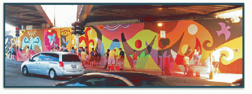 Community mural created in Chicago on the corner of Addison and Avondale after an incident involving a gang shooting. Community leaders got together and now the underpass is crossed safely by parents and students on their way to school. 2011.