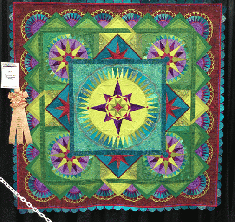 Taking the Unmapped Road by Margaret Solomon gunn (Gorham ME) won Best Movable Machine Workmanship' at the AQS Quiltweek Lancaster 2018