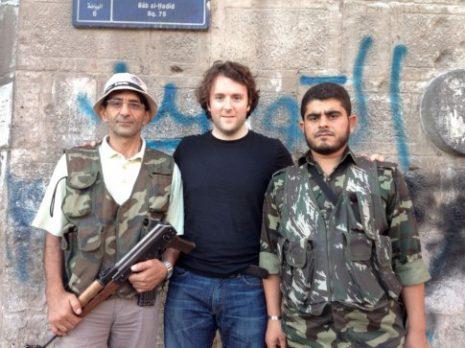 Aleppo, 2012  Michael Weiss with those lovable Syrian Jihadists.  He's the one in the middle., From InText