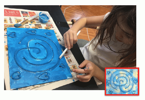 The author's granddaughter working on a finger labyrinth.