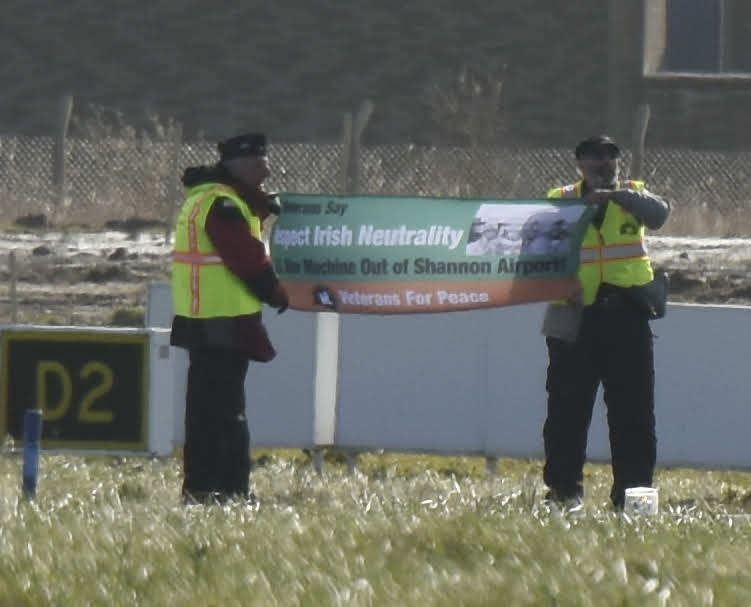 Ken Mayers and Tarak Kauff unveil banner on the airfield at Shannon. Photo:Ellen Davidson, From InText