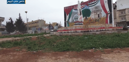 Mural of the Arab Socialist Ba'ath Party — Syria Region at the Mihrab roundabout in the center of the city of Idlib, northwestern Syria., From Uploaded