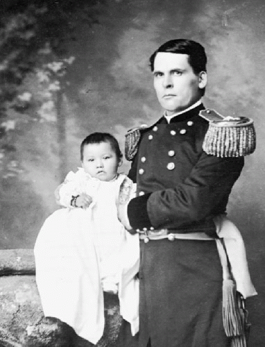 Gen. L. W. Colby of Nebraska State Troops Holding Baby Girl, Zintkala Nuni (Little Lost Bird), Found On Wounded Knee Battlefield, South Dakota, 1890 n.d.