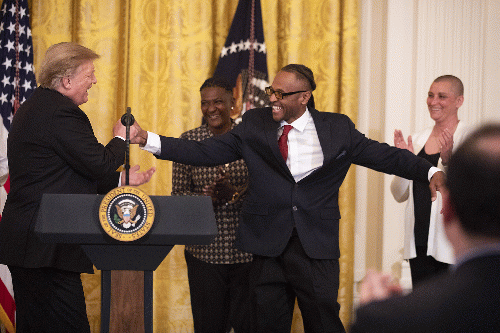 President Donald Trump congratulates former inmates who have benefited from prison reform legislation, April 1, 2019.