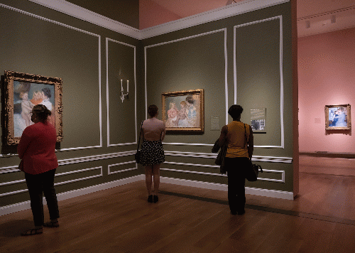 Visitors view the exhibition,  Whistler to Cassatt: American Painters in France' at VMFA.