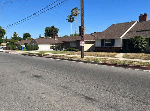 A neighborhood of modest houses.