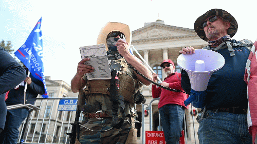 Members of a Georgia MAGA militia in front of the state capitol, Atlanta. All photos by Zach D. Roberts for the Palast Investigative Fund. (2020) Re-print permitted with attribution